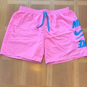 Nike Pink Swim Trunks with Blue Accents
